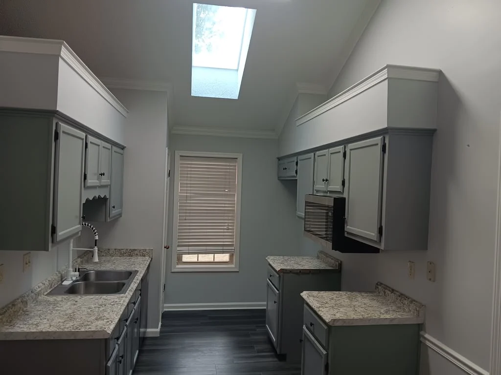Updated kitchen with gray cabinetry